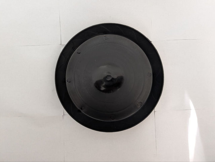 Top view of Green Oasis heavy-duty black plant saucer