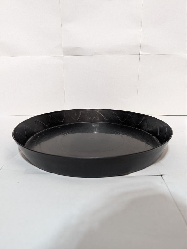 Green Oasis heavy-duty black plant saucer with raised rim